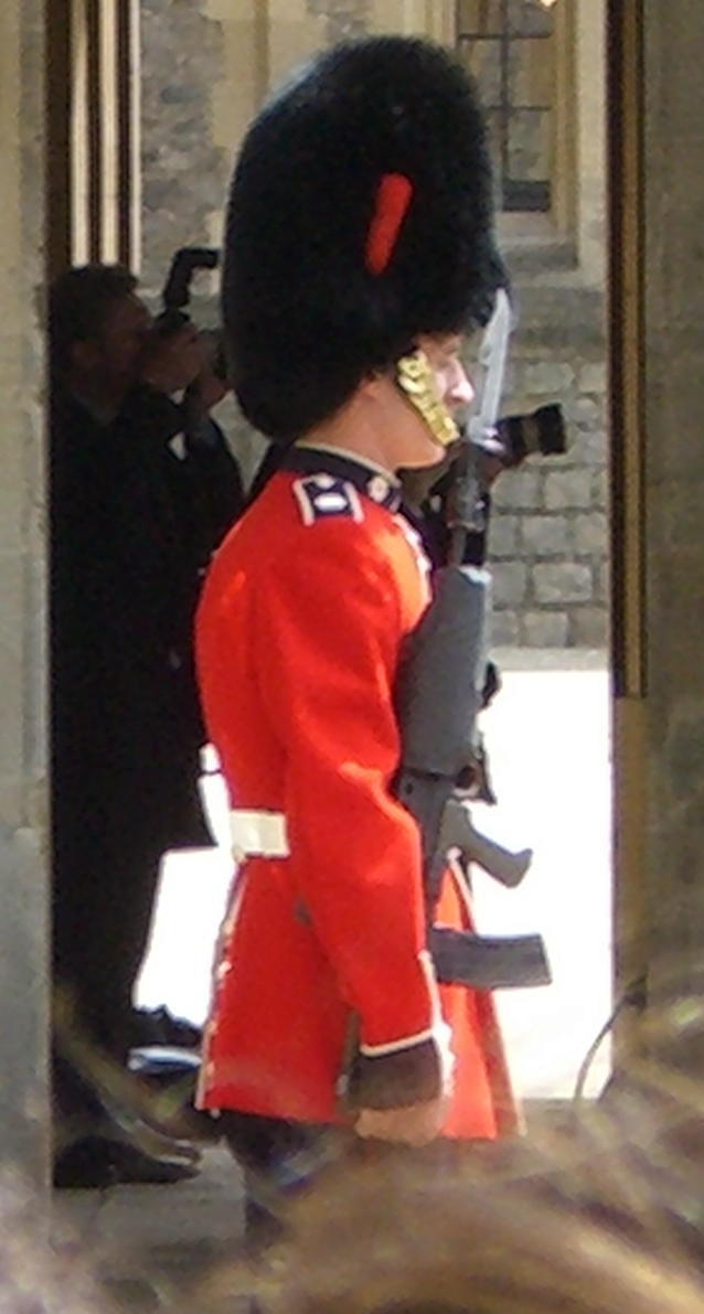 Traditional guard with modern rifle
